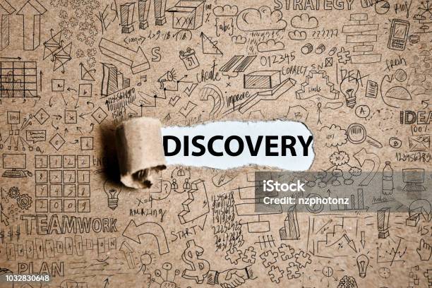 Discovery Cardboard With Charts And Text Concept Stock Photo - Download Image Now