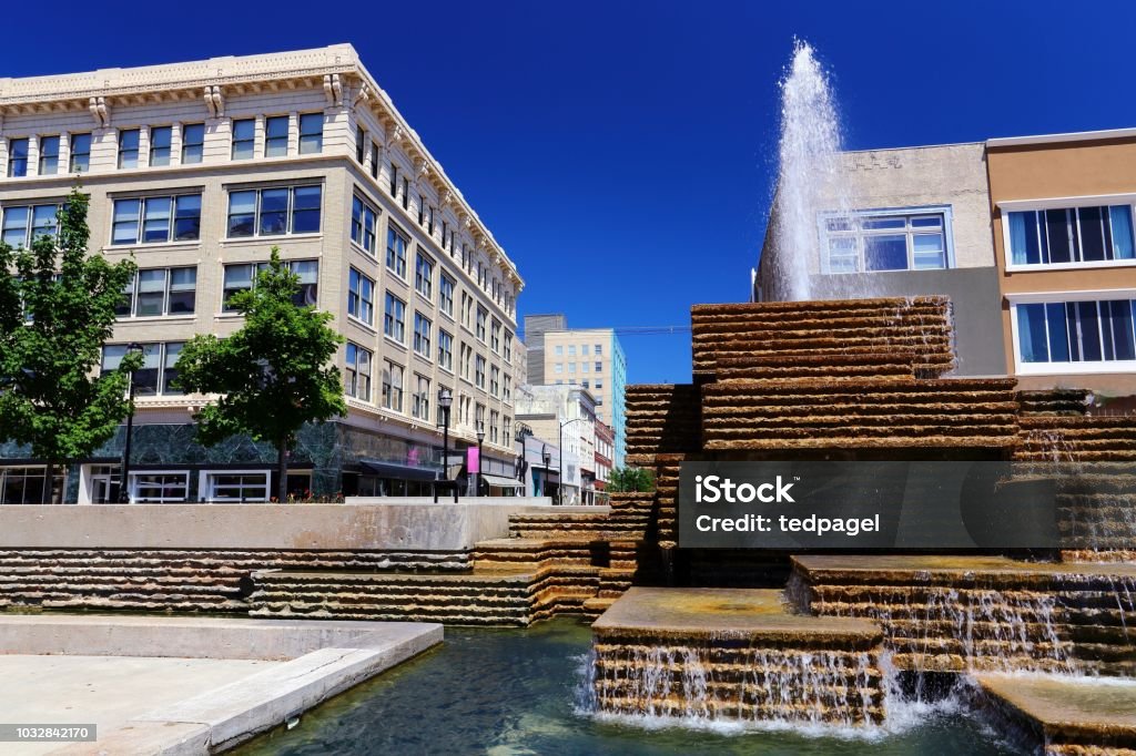 Down town Springfield Missouri fountain and office buildings around the square in Springfield Missouri Springfield - Missouri Stock Photo