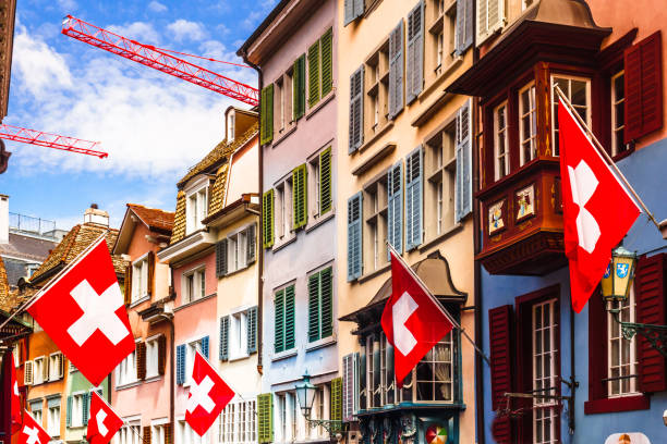 istock View on Augustinergasse in Zurich with flags - Switzerland 1032844890