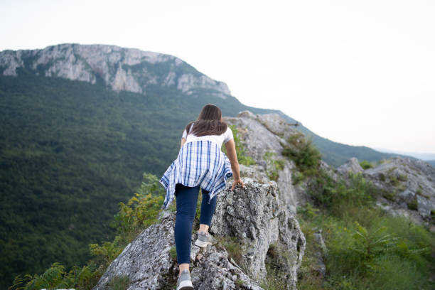 girl enjoy on mountain peak