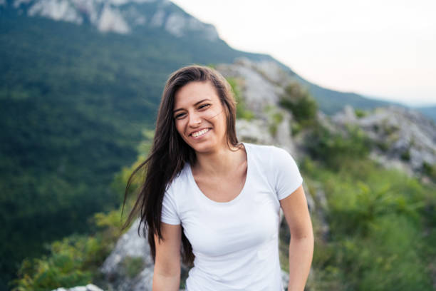 girl enjoy on mountain peak