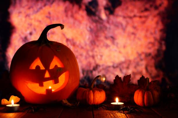 istock Halloween Jack o Lantern with orange grunge background 1032890820