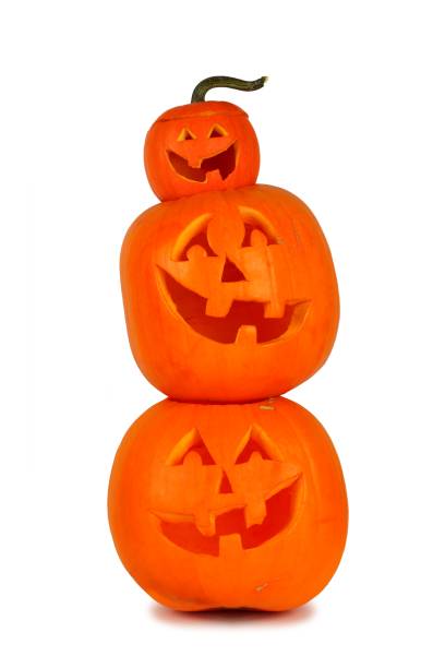 istock Stack of Halloween Jack o Lanterns isolated on white 1032895548