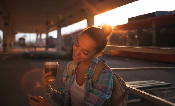 istock Surfing the net on train station 1032903978