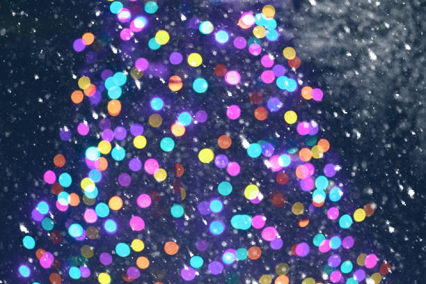 istock Christmas Lights Winter Background Abstract Crystals Circles Snow Falling 1032922370