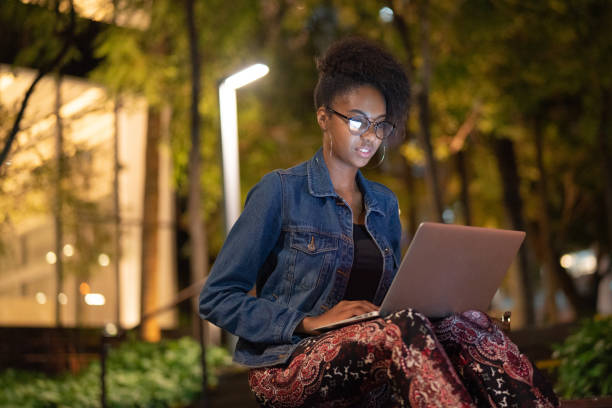 istock Afro young woman working in her laptop 1032925004