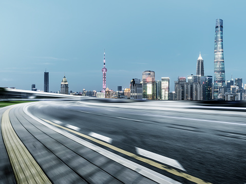 empty tarmac road front of Shanghai skyline,auto advertising backplate,Shanghai,China,Asia.