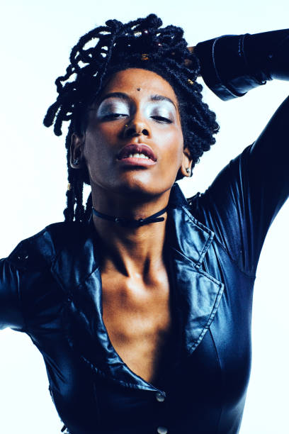 istock Woman with long dreadlocks and blue eyeshadow 1032930330