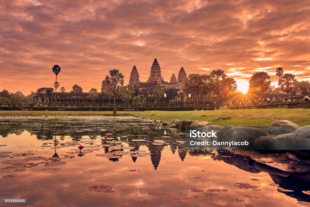 View of Angkor Wat at sunrise, Archaeological Park in Siem Reap, Cambodia UNESCO World Heritage Site View of Angkor Wat at sunrise, Archaeological Park in Siem Reap, Cambodia UNESCO World Heritage SiteView of Angkor Wat at sunrise, Archaeological Park in Siem Reap, Cambodia UNESCO World Heritage Site Angkor Wat Stock Photo