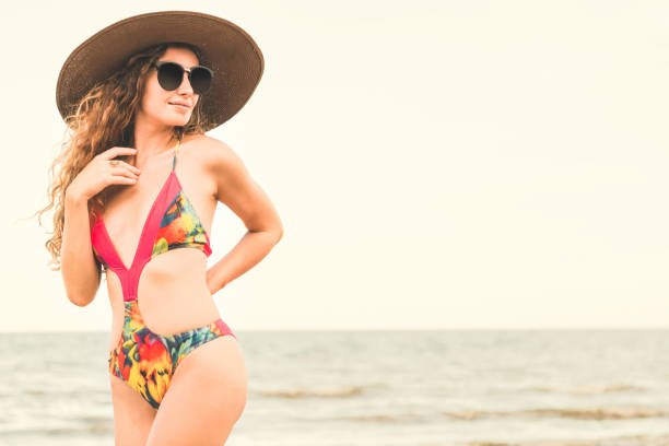 istock Happy young woman at beach in summer vacation. 1032930770