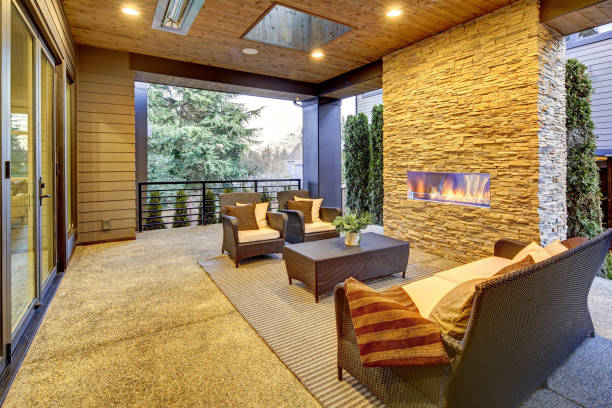 istock Luxury modern deck exterior with stone fireplace and wooden ceiling 1032935144