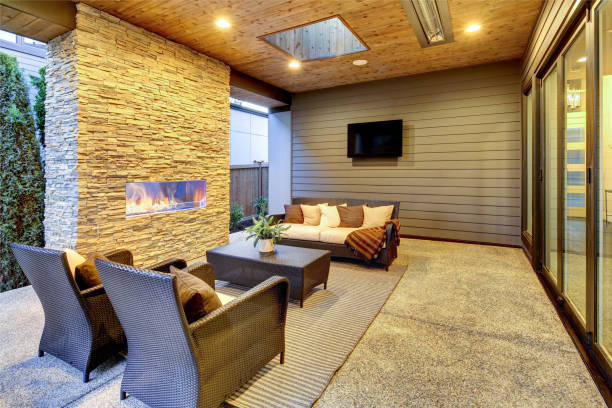 istock Luxury modern deck exterior with stone fireplace and wooden ceiling 1032935166
