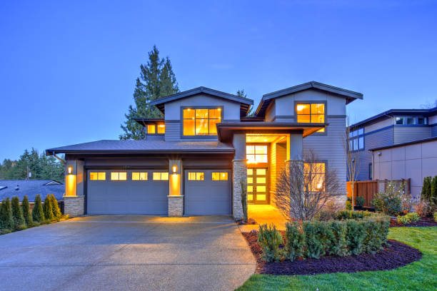 istock Grey luxury modern two story tall house exterior with stone columns 1032935630