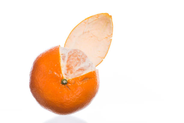 istock Close up of a mandarin orange isolated on white 1032935770