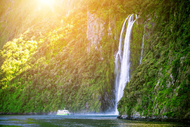 istock Scenic cruise approaches waterfall, Milford Sound. 1032940418