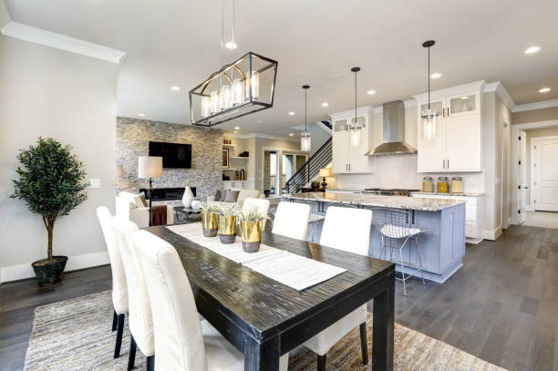 istock Beautiful kitchen in luxury modern contemporary home interior with island and chairs 1032940636