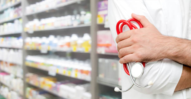 istock Male pharmacist working at the pharmacy. 1032940810