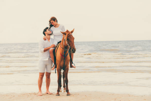 Grandfather carrying boy on his shoulders at the beach, Hollywood Beach, Florida, USA
