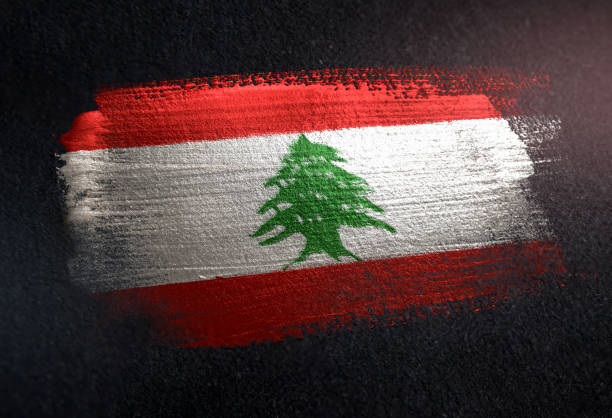 lebanon flag made of metallic brush paint on grunge dark wall - lebanese flag imagens e fotografias de stock