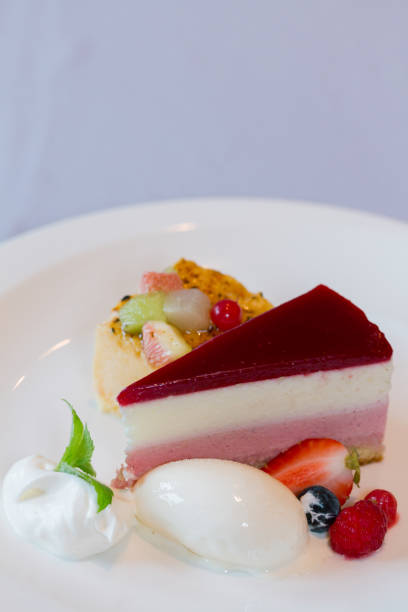 istock fruit cake and ice cream on the table at cafe 1032945818