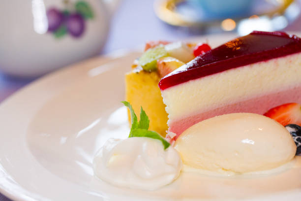 istock fruit cake and ice cream on the table at cafe 1032945854