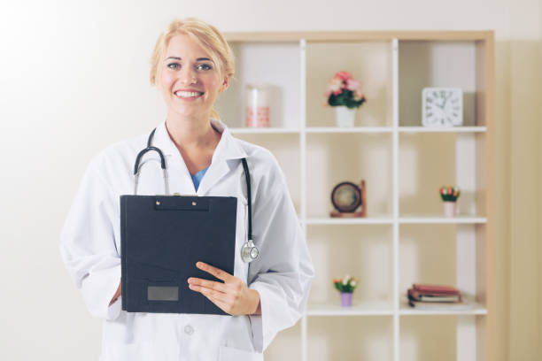 istock Young female doctor working in hospital office. 1032952704