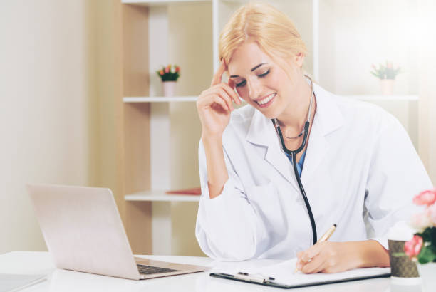 istock Young female doctor working in hospital office. 1032952730