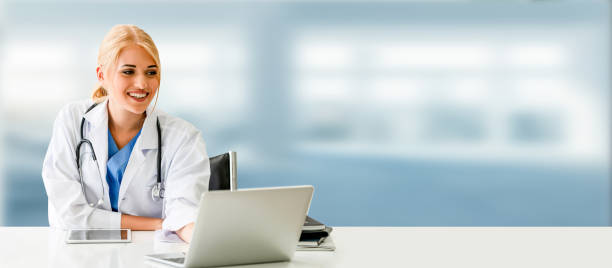 istock Doctor using laptop computer at the hospital. 1032952840
