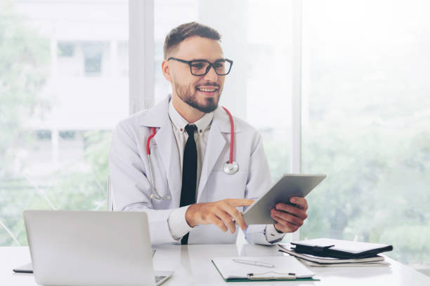 istock Doctor working on tablet computer in the hospital. 1032952936