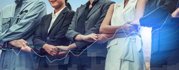 istock Double exposure business people holding hands. 1032955224