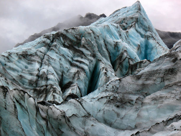 istock Icy Peak on Fox Glacier, New Zealand 1032955306