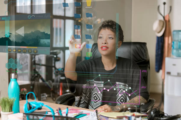 istock Professional Woman Operating a Futuristic Computer Screen 1032955316
