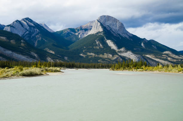 istock Athabasca River in Jasper in Autumn, Canadian Rockies, Alberta, Canada 1032972062