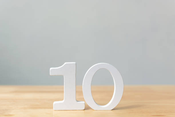 Number ten wooden material on table with copy space Number ten wooden material on table with copy space number 10 photos stock pictures, royalty-free photos & images