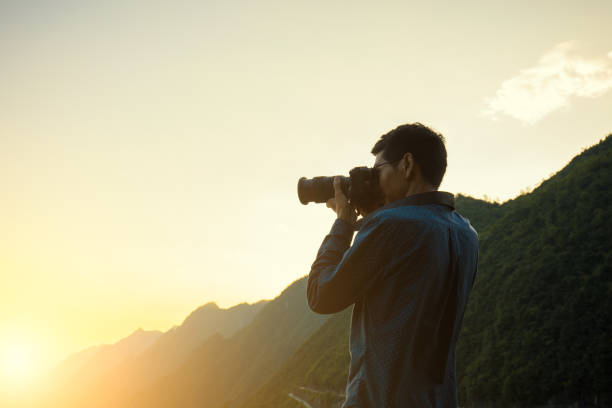 istock Taking a photo in the mountains 1032978210