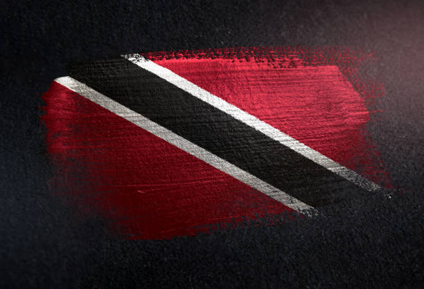 Trinidad and Tobago Flag Made of Metallic Brush Paint on Grunge Dark Wall Trinidad and Tobago Flag Made of Metallic Brush Paint on Grunge Dark Wall port of spain stock pictures, royalty-free photos & images