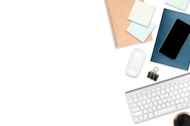 istock Flat lay photo of office table with laptop computer, digital tablet, mobile phone and accessories. on isolated white background. Desktop office mockup concept. 1032989714