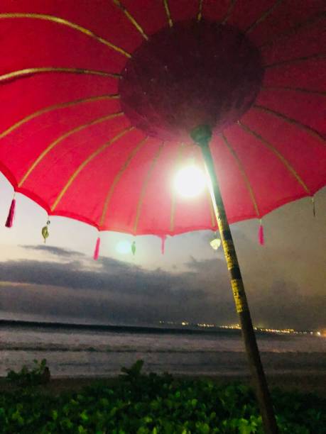 istock sunset at Kuta beach in Bali, Indonesia 1033005144