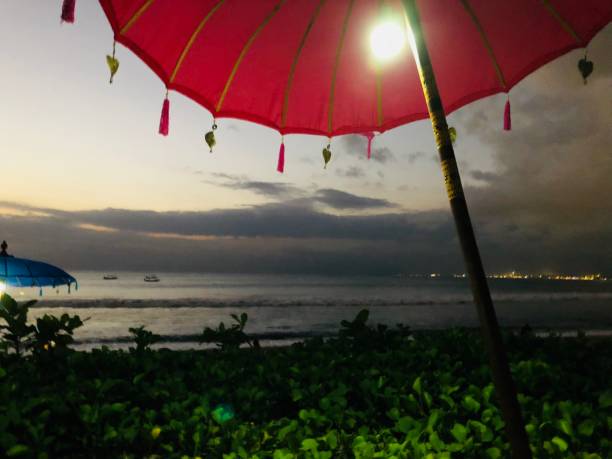 istock sunset at Kuta beach in Bali, Indonesia 1033005330