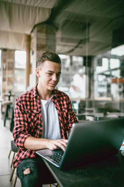 istock Young Male Freelancer Working In The Morning 1033015634