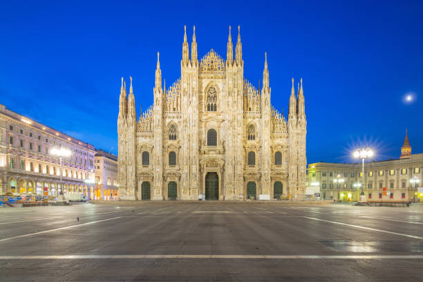 istock Milan Cathedral from the square at twilight in Milan, Italy 1033025318