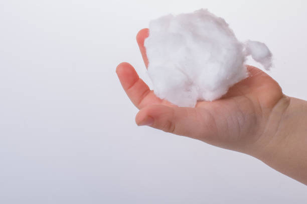 istock Hand holding some cotton in hand 1033034506