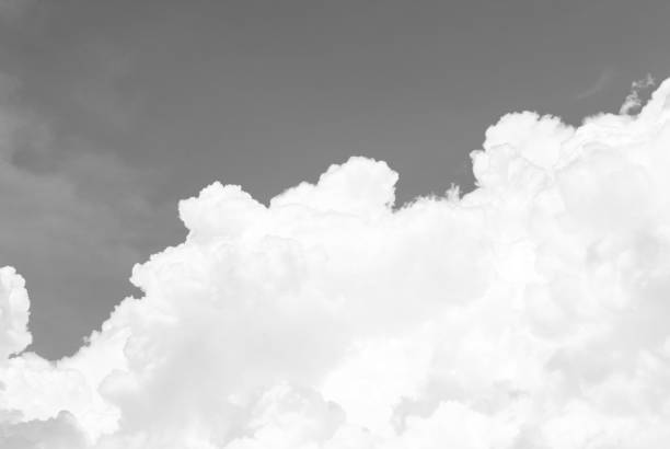 istock black and white Fluffy big beautiful cloud with bright sky for texture background 1033048272