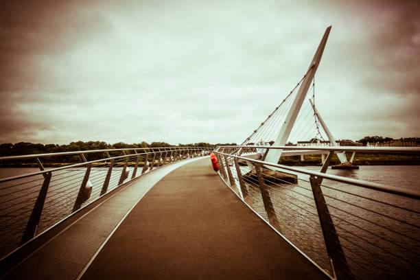 istock peace bridge in Londonderry Northern Ireland 1033053136