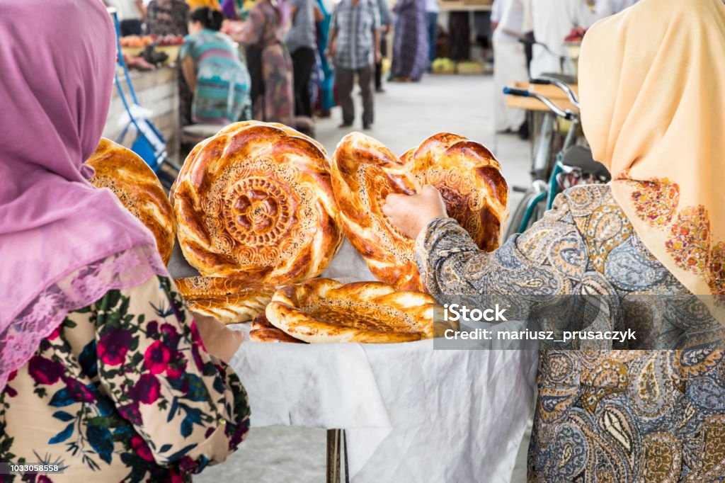 Traditional uzbekistan bread lavash at local bazaar, is a soft flat-bread of Middle Asia (Uzbekistan). Uzbekistan Stock Photo