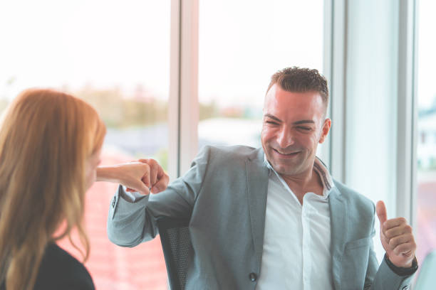 istock Boss thumb up for female worker compliment 1033063410
