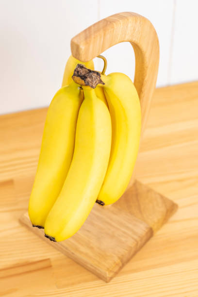 istock Wooden banana hanger 1033063540