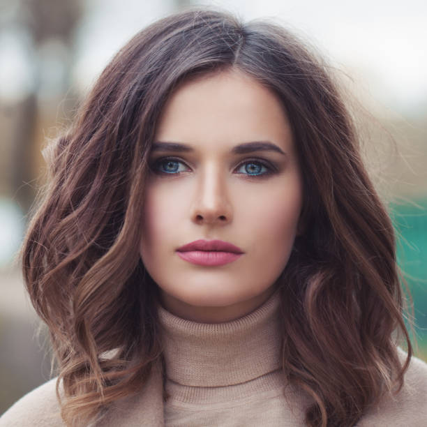 istock Young beautiful female face closeup, portrait 1033073216