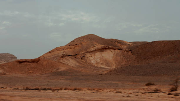 istock An Egyptian Desert And Mysty Sky in the daylight 1033087578