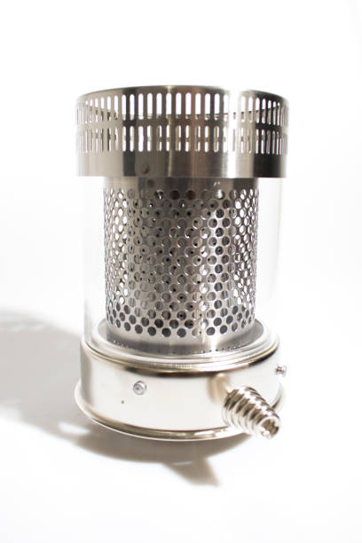 istock Combustion chamber of a kerosene heater in a white background composition 1033093930